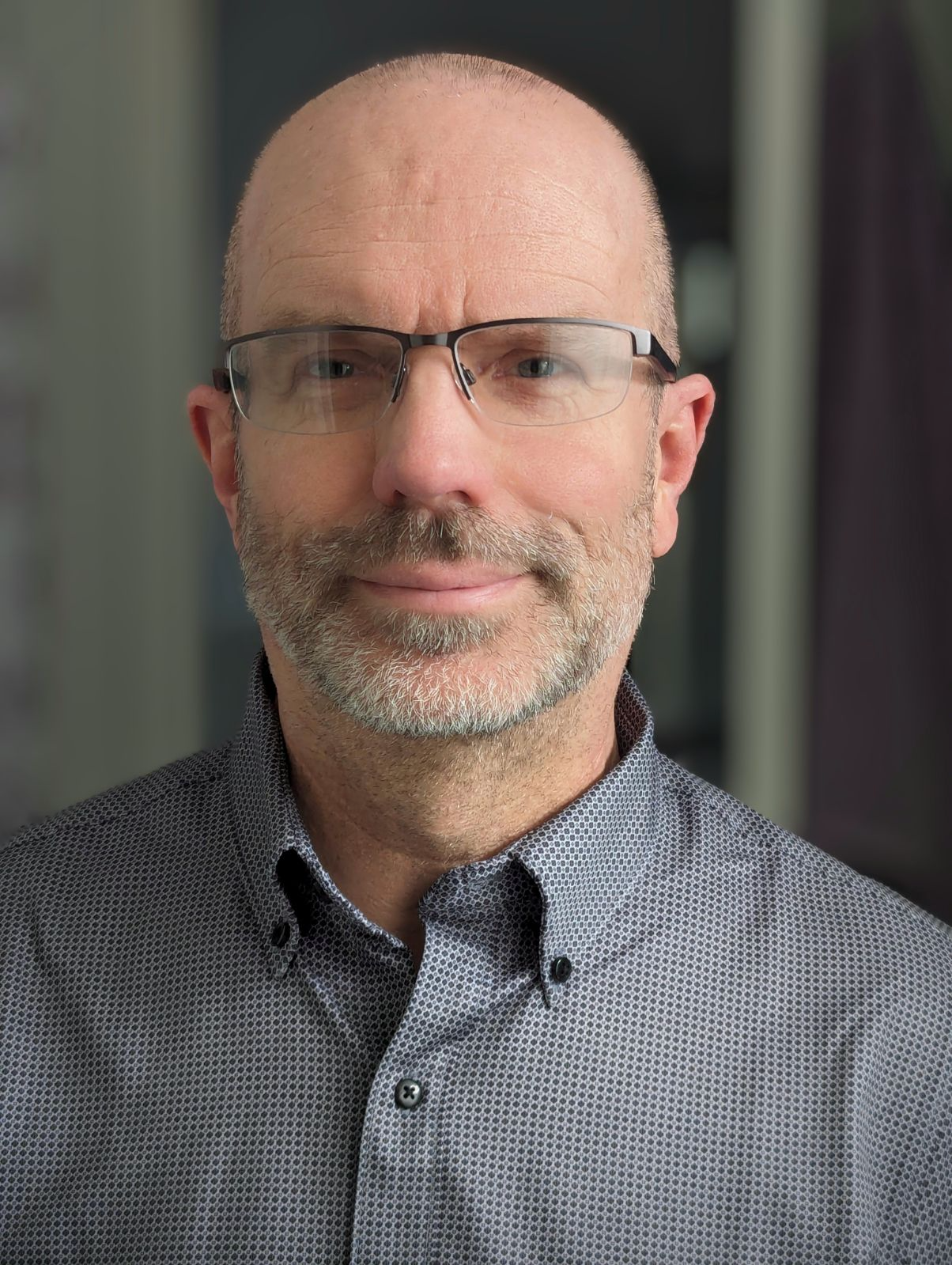 Author photo of Brian L. Plescher: profile, neutral background